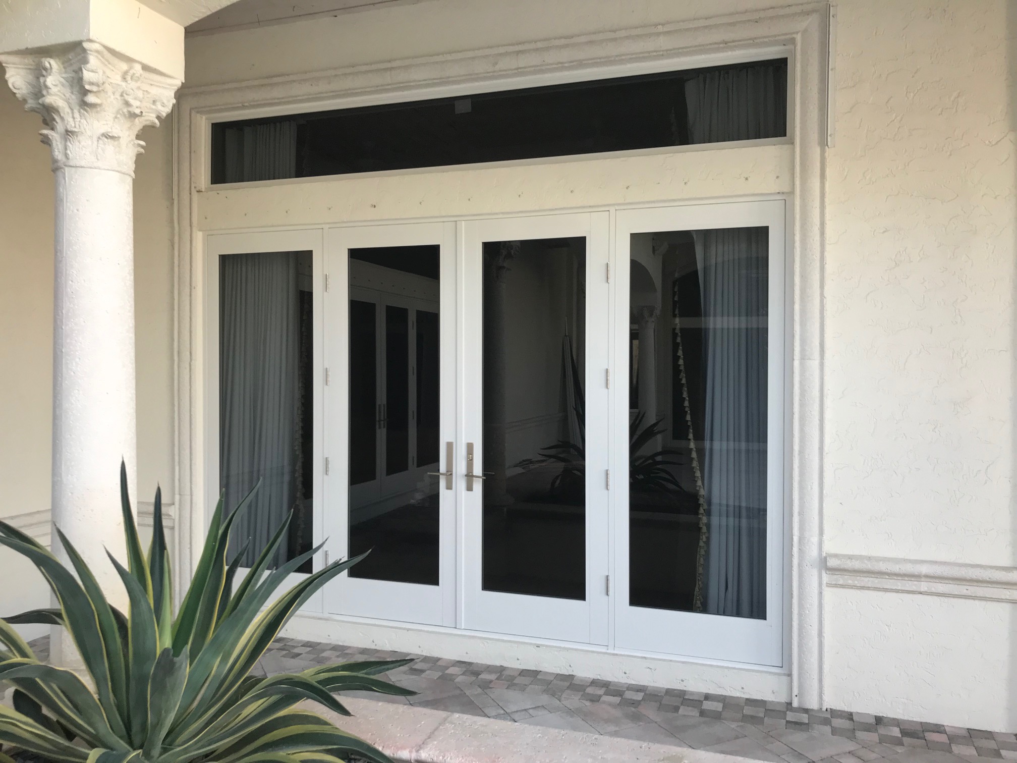 SIW Impact French Doors_ Job E 3 caption_ White Glass Door with Sidelights_Outside View