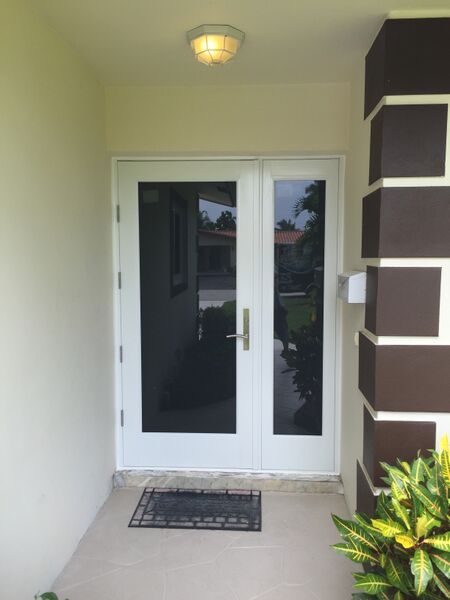SIW Impact French Doors_ caption_ SIW Impact Door with White Privacy Innerlayer
